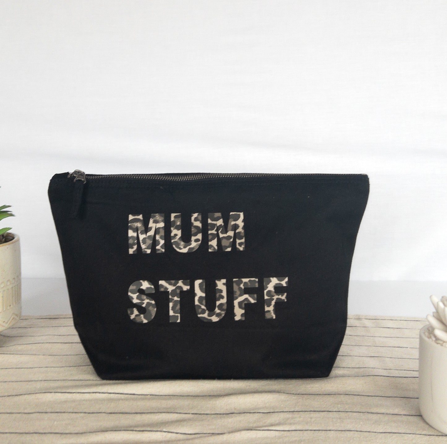 Black recycled canvas pouch with metallic leopard print personalisation
