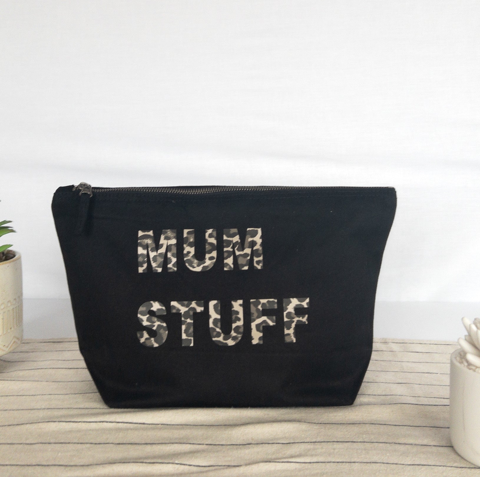 Black recycled canvas pouch with metallic leopard print personalisation